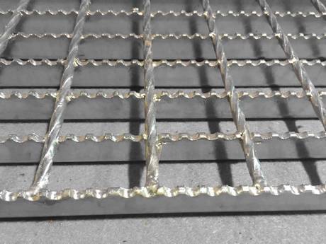 A part of serrated steel grating.