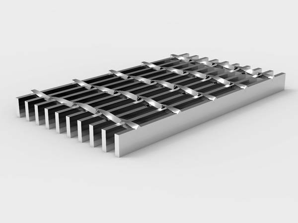 A piece of stainless steel heavy duty steel grating on gray background.