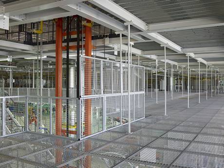 This is second floor of factory with steel grating partition panels.