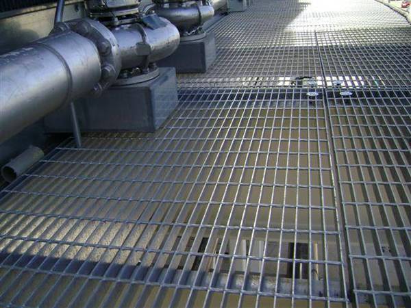 Welded platform grating with smooth surface.