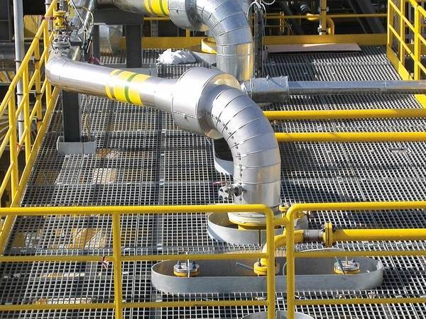 A platform with welded steel grating flooring.