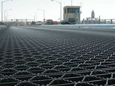 This is riveted grating with serrated surface.