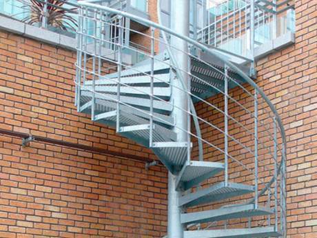 A stair made of spiral stair tread steel grating is used in a civil building.