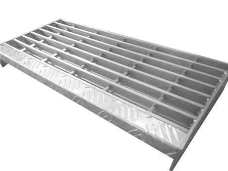 A swage-locked stair tread steel grating with zinc coated surface and checker plate nosing.