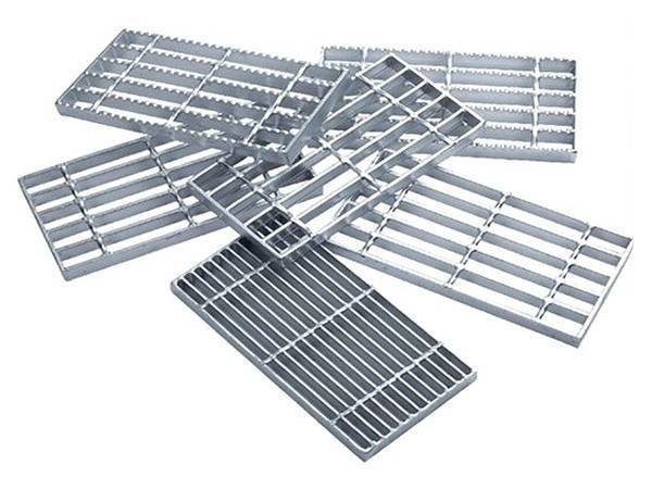 Several different types of steel bar gratings on white background.