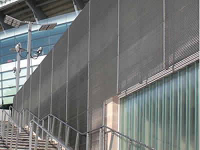 The external of the mall covered with steel grating facade.