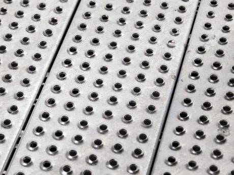 A part of traction-grip safety grating.