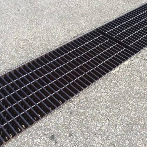 A line of trench drain cover is made of carbon steel grating.